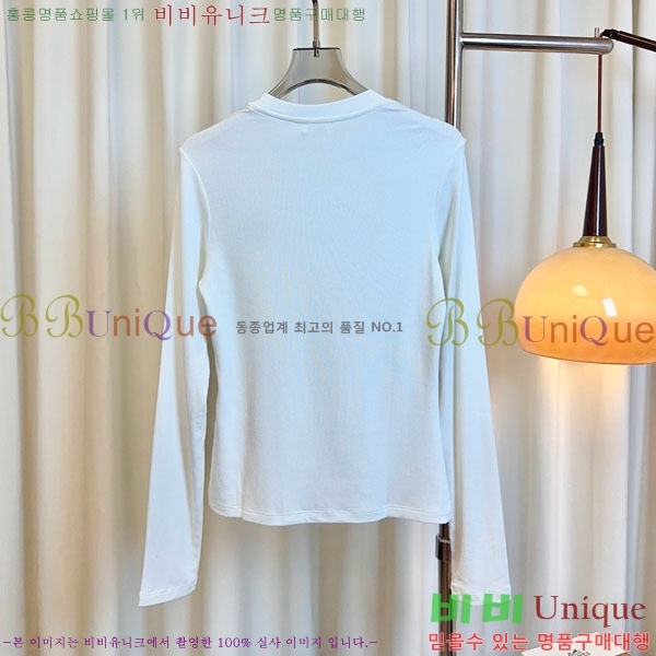   Ƽ CE233122-2