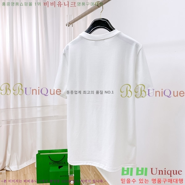    Ƽ D9076386-2